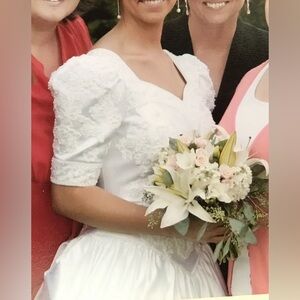 White modest Wedding Dress with sleeves! 
Size 8